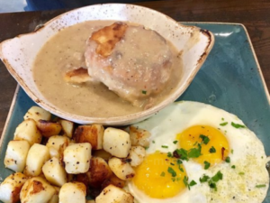 Biscuits and Turkey Sausage Gravy with Eggs. 